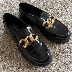 Nine West Glossy Black Loafers with Bold Gold Chain